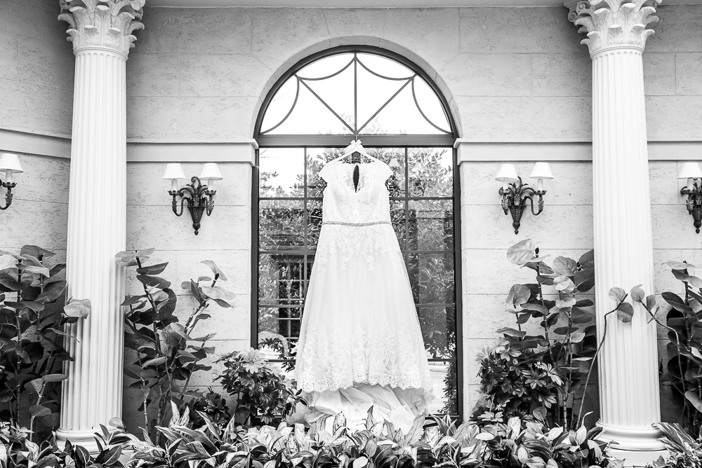 dress hanging in window at Desmond hotel wedding in malvern PA